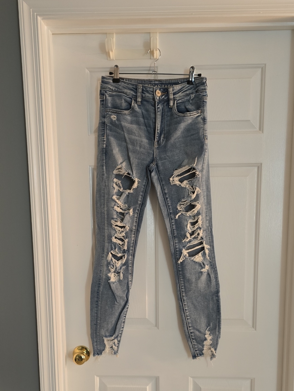 American Eagle Distressed Light Blue Women’s High Riae Jeggings